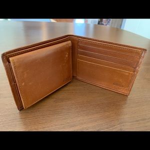 Classic Authentic Coach wallet in tan leather